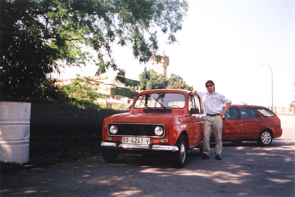 Asier stood beside his red Renault 4