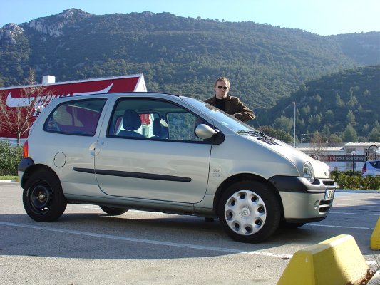 Side view of the myself and the Renault Twingo with missing hubcap