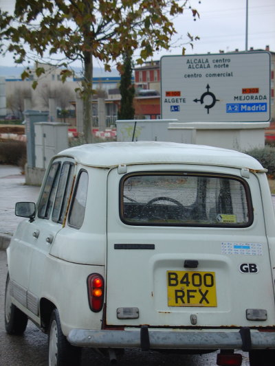 Reflexia waits at a road junction before leaving Alcala, with a signpost proving her presence in the centre of Spain