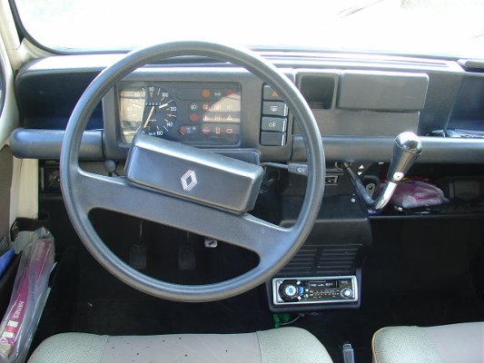 The left-hand driving layout with gearstick on the right, and my ugly cassette radio fixed in the centre console