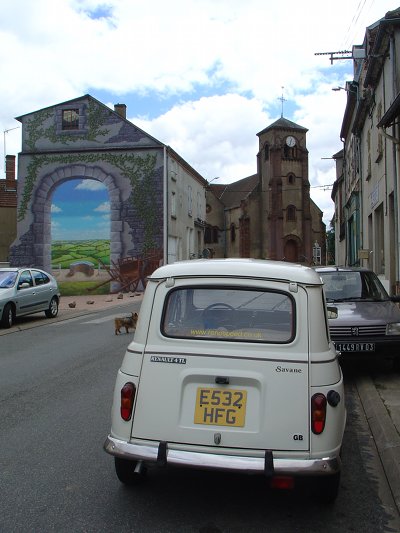 Queen Geanine in front of a 'trompe l'œil' in the small village of Saint Léon in the Allier, France, July 2011