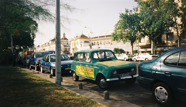 A green R4 parked in the centre of Seville
